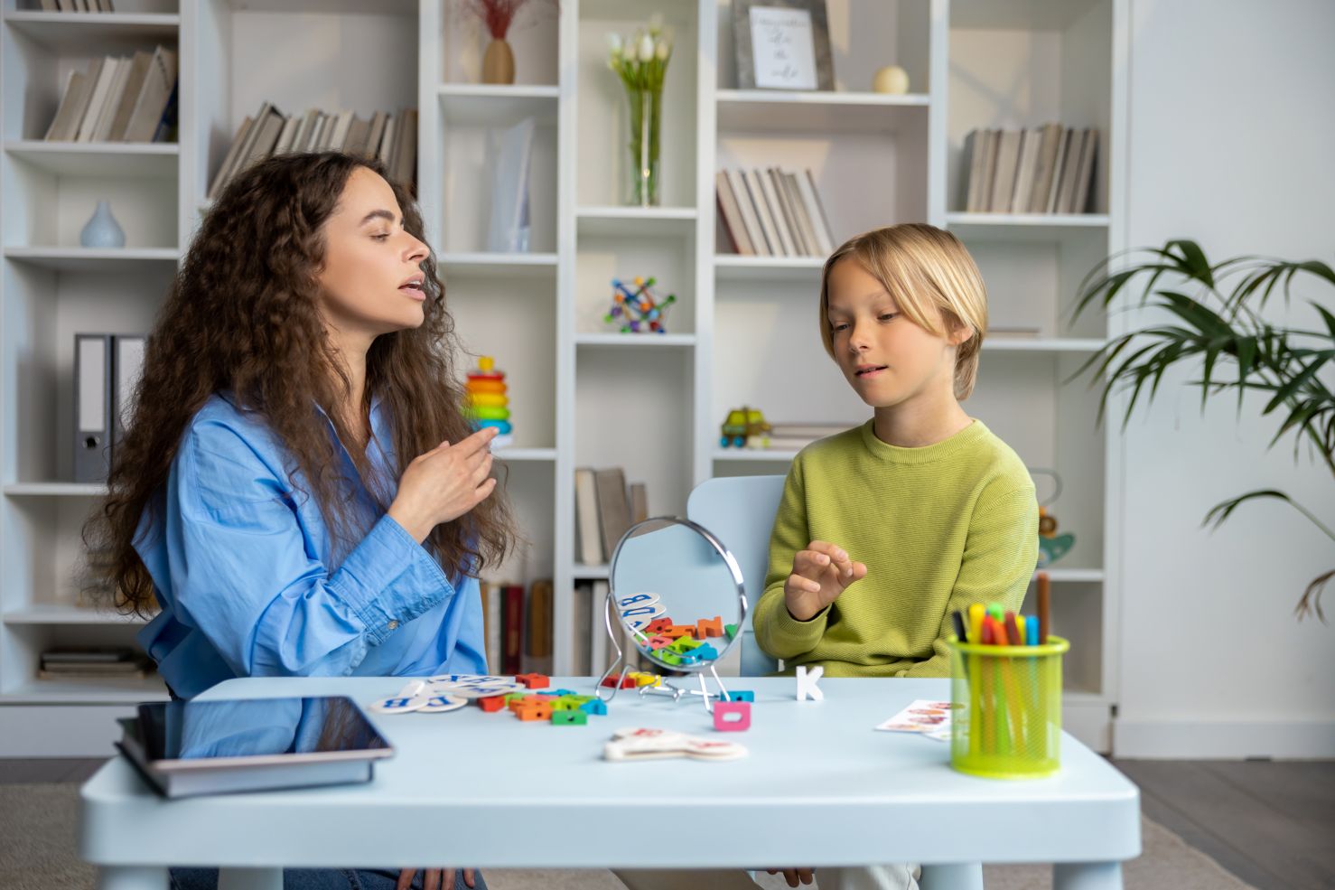 Auditory-Verbal-Therapy-session child attending auditory verbal therapy